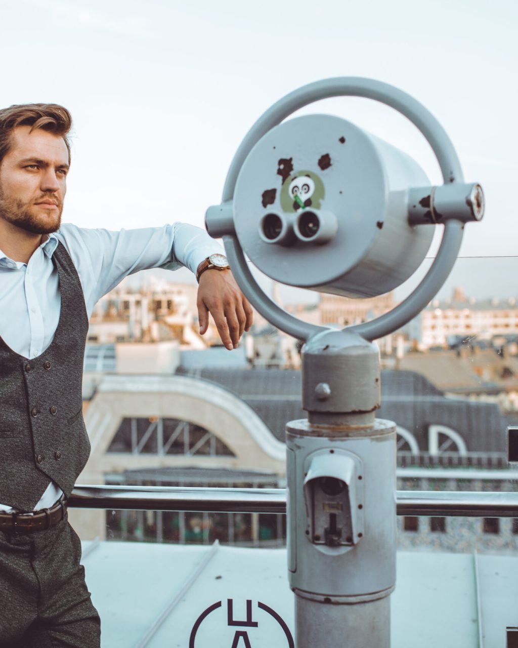 the man in the suit walks in the city